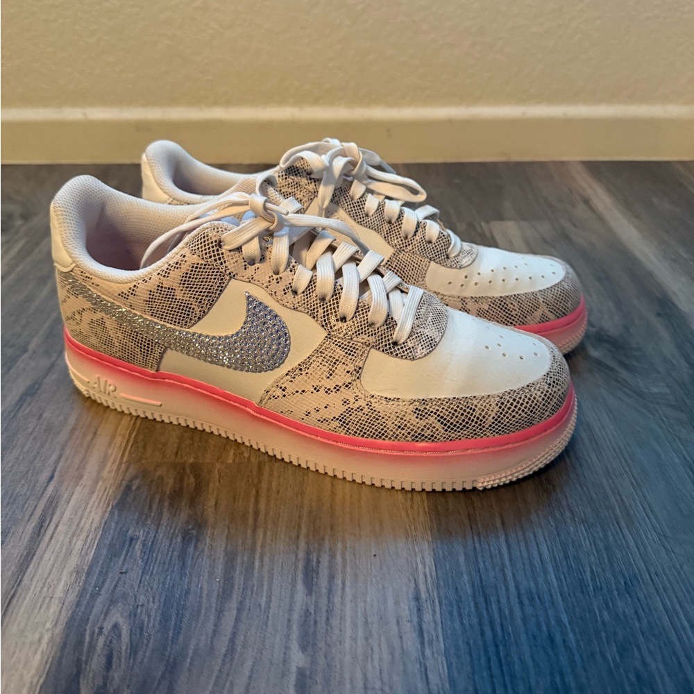 Bedazzled with Swarovski crystals AF1’s with snake print